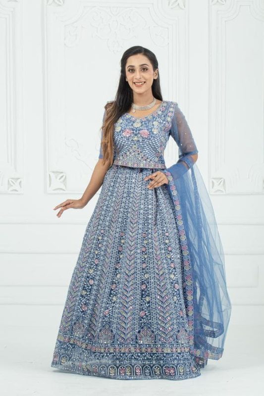 Beautiful beige Lehenga with Lavish Embroidery and Radiant Mirror Work